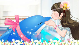 Bisous entre une fille et son dauphin